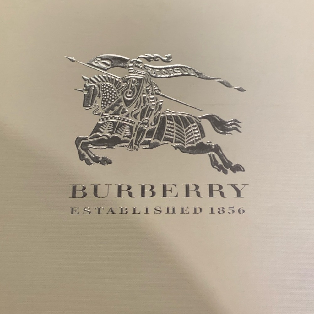 Burberry black leather ankle bootie, with heel.